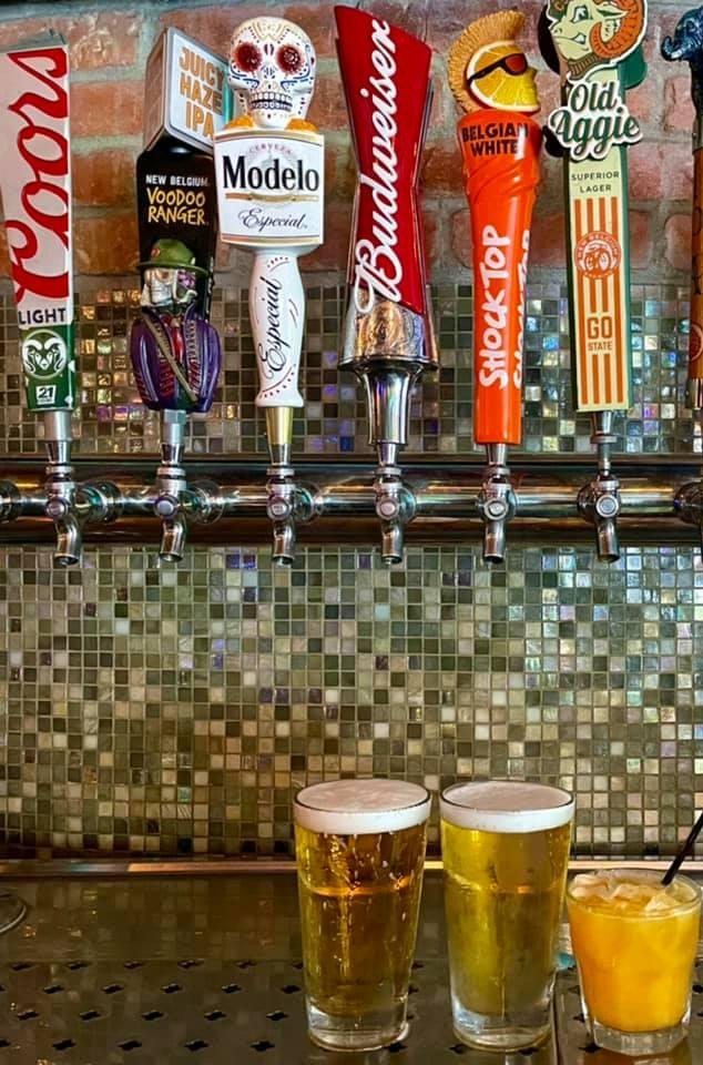 The taps at Tony's and three fresh pints on the bar